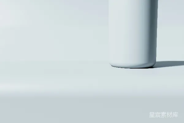 高清摄影 一个白色的圆柱形物体在白色表面上。