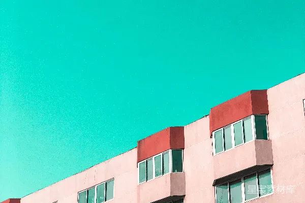 高清摄影 粉红色的混凝土建筑在白天湛蓝的天空下