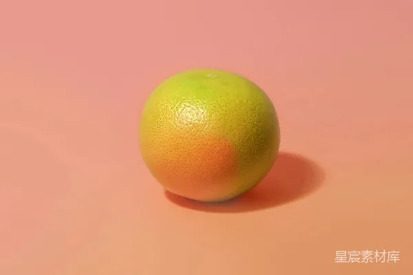 高清摄影 粉红色表面上的黄色圆果