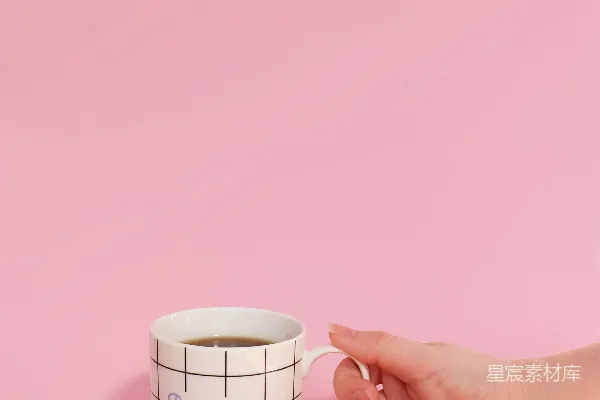 高清摄影 带有手的白色杯子