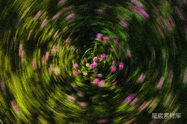 高清摄影 模糊的绿色和粉色花卉漩涡。