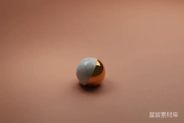 高清摄影 一个橙白相间的球体在棕色的表面上。