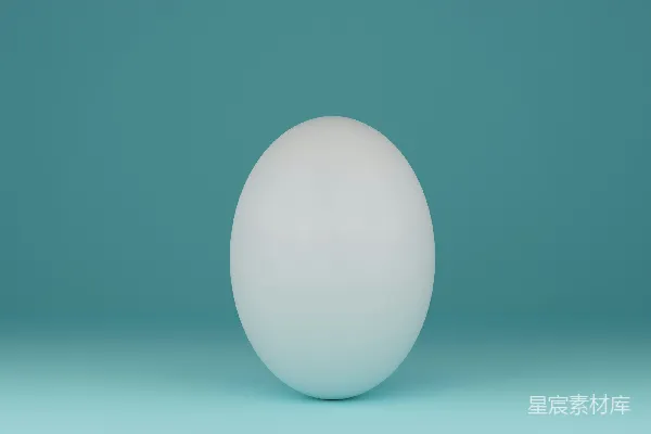 高清摄影 一个白色的球体放在蓝色的表面上。