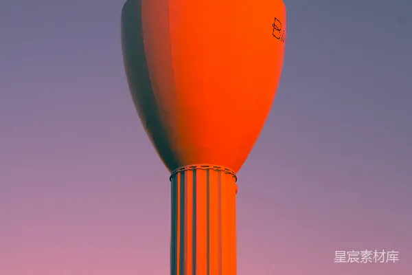 高清摄影 夕阳下的橙色水塔