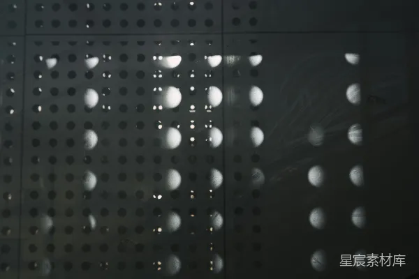 高清摄影 光影交错的孔洞背景