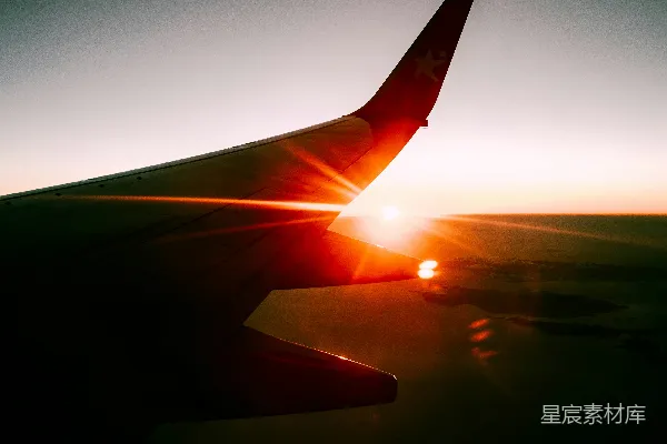 高清摄影 飞机翅膀与夕阳