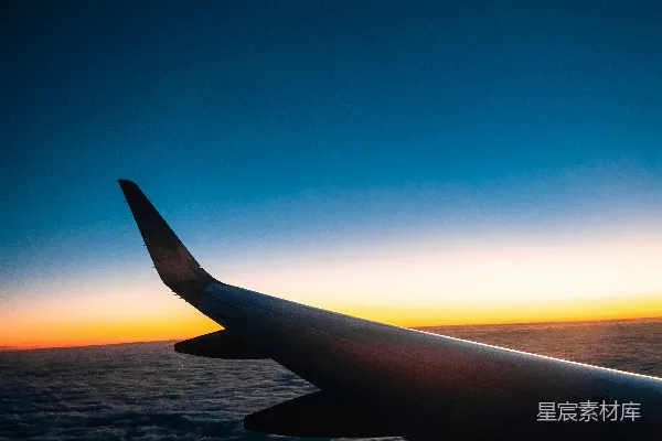 高清摄影 飞机翼下的日落
