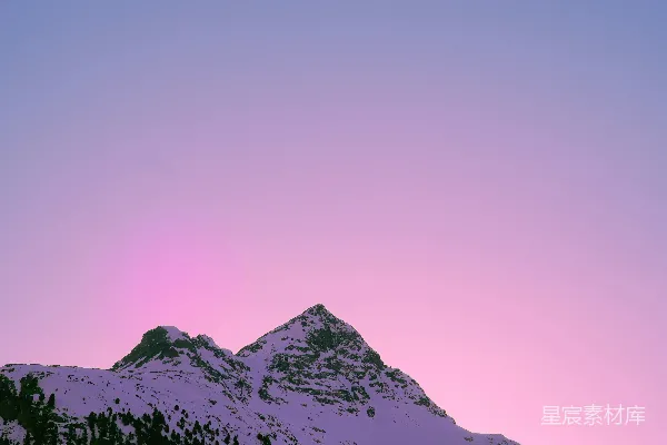 高清摄影 夕阳下的雪山剪影