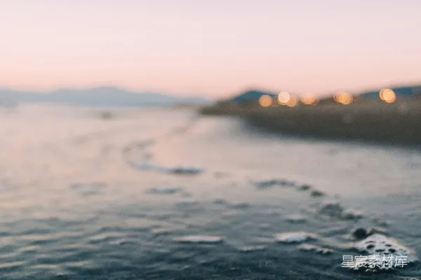 高清摄影 黄昏海边的泡沫与脚印