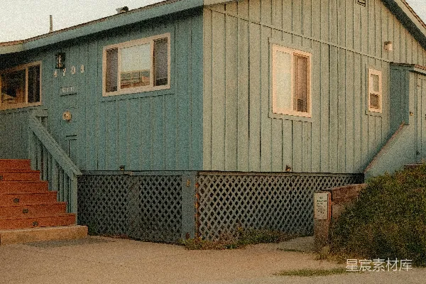 高清摄影 蓝绿色的海滨小屋