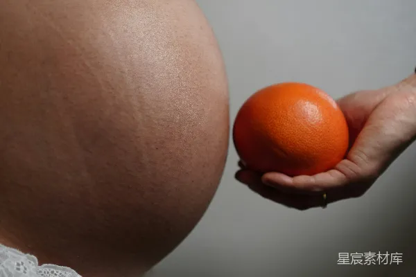 高清摄影 孕妇与橙子