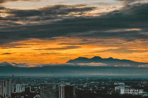 高清摄影 城市的日落与山峦