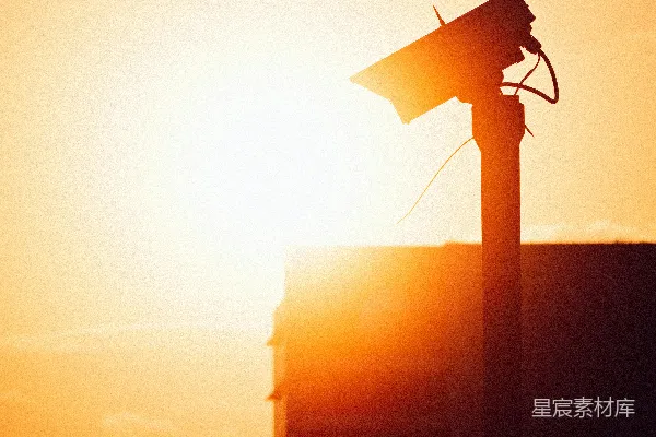 高清摄影 夕阳下的监控摄像头剪影