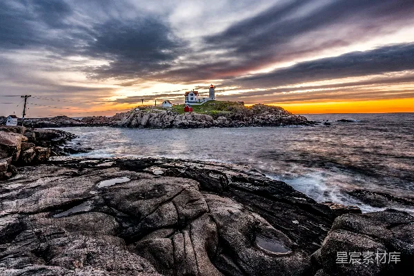 高清摄影 岩石海岸的日落灯塔