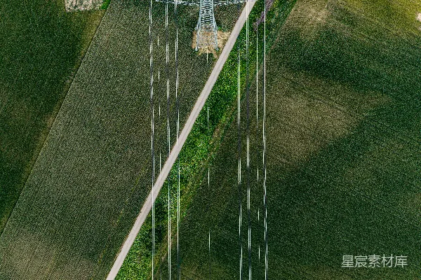 高清摄影 绿野之上，电力线杆的 aerial 视角。