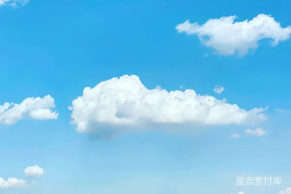 高清摄影 白天棕色地块下的白云和蓝天
