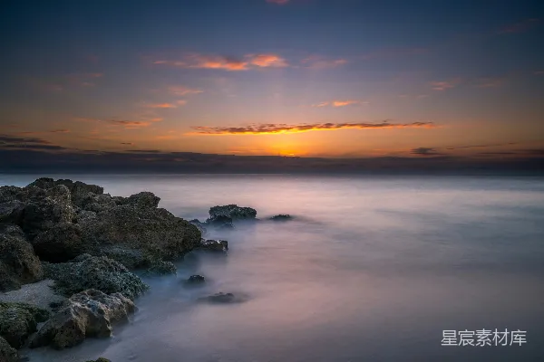 高清摄影 夕阳下的海洋长曝光照片